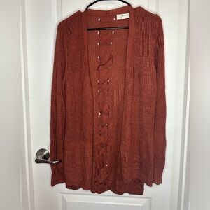 Large Pinque Jamelya rust cardigan with crisscross back detail
